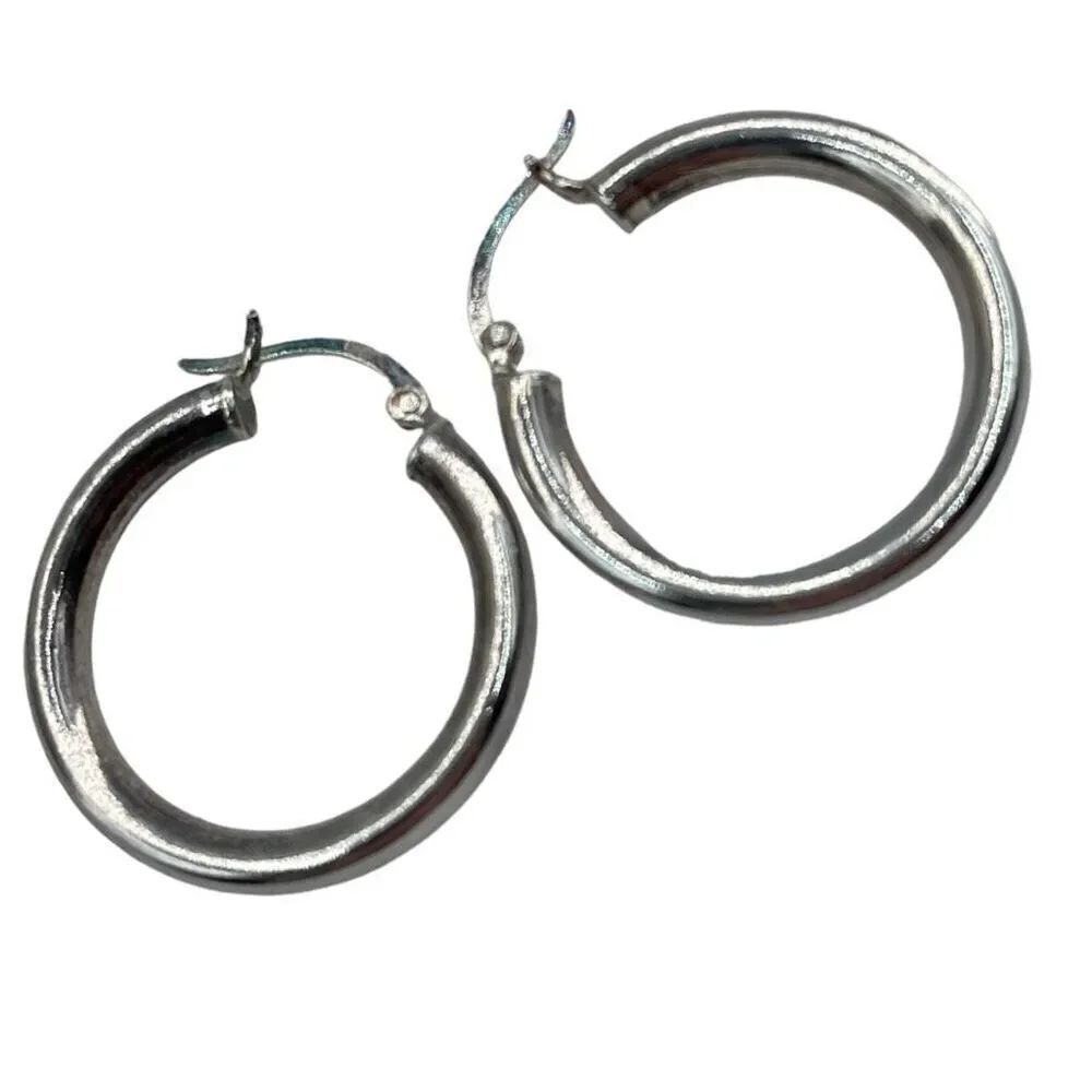 Sterling silver hoops simple round bar locking.